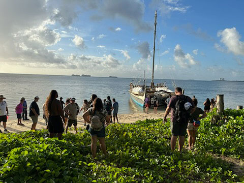 Boarding the catamaran